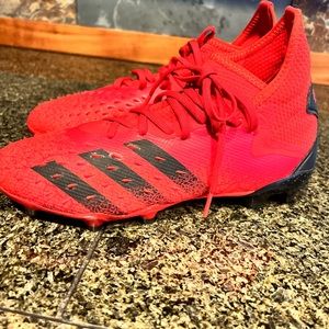 Predator Red cleats!  Worn once.  No box size 6.5 mens. Firm Ground.